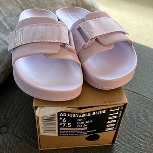 Nobull adjustable women’s slides sandals New size 7.5